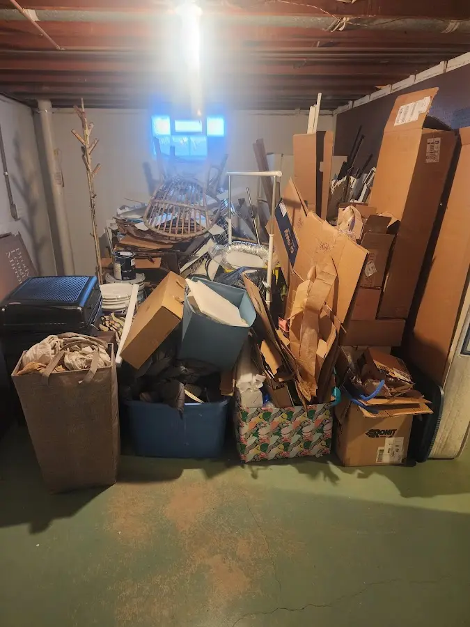 Roll-off dumpster container at job site for 2 Yard Dumpster Rental in Ecorse